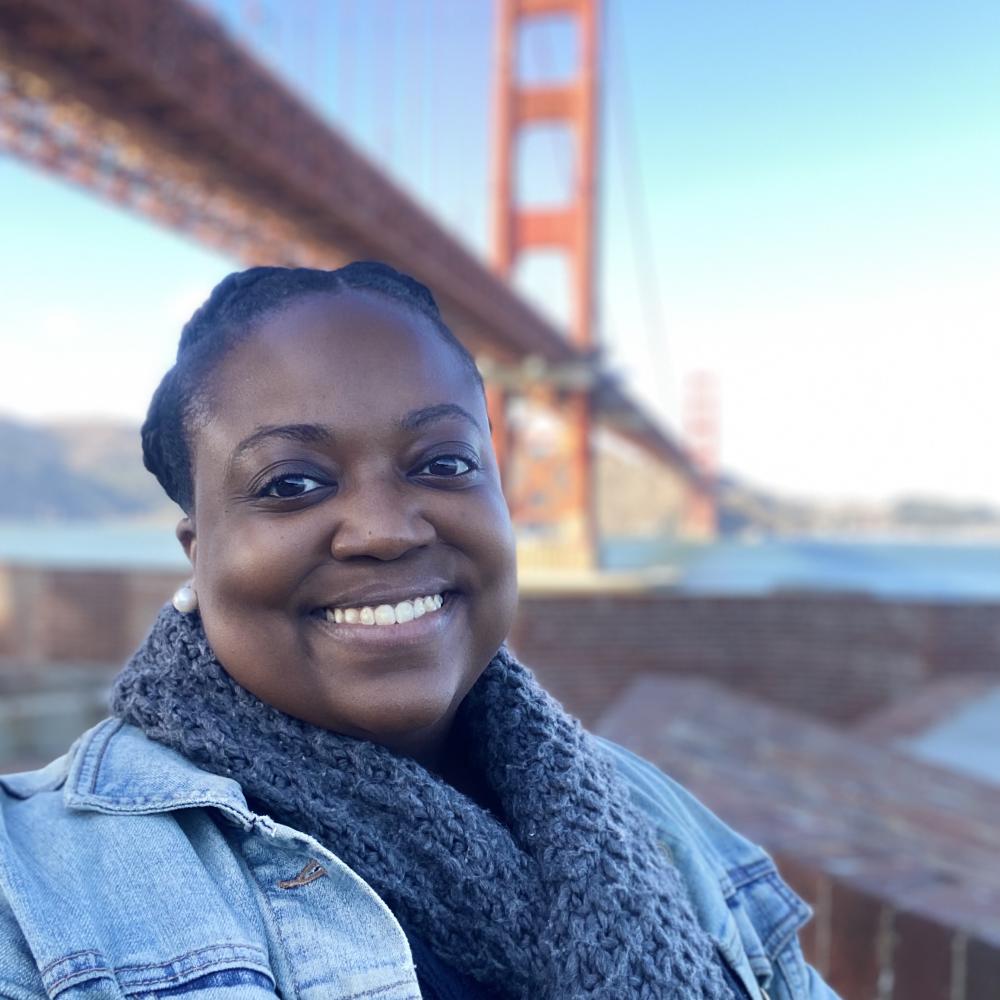 photo of alana chaney with golden gate bridge in the background