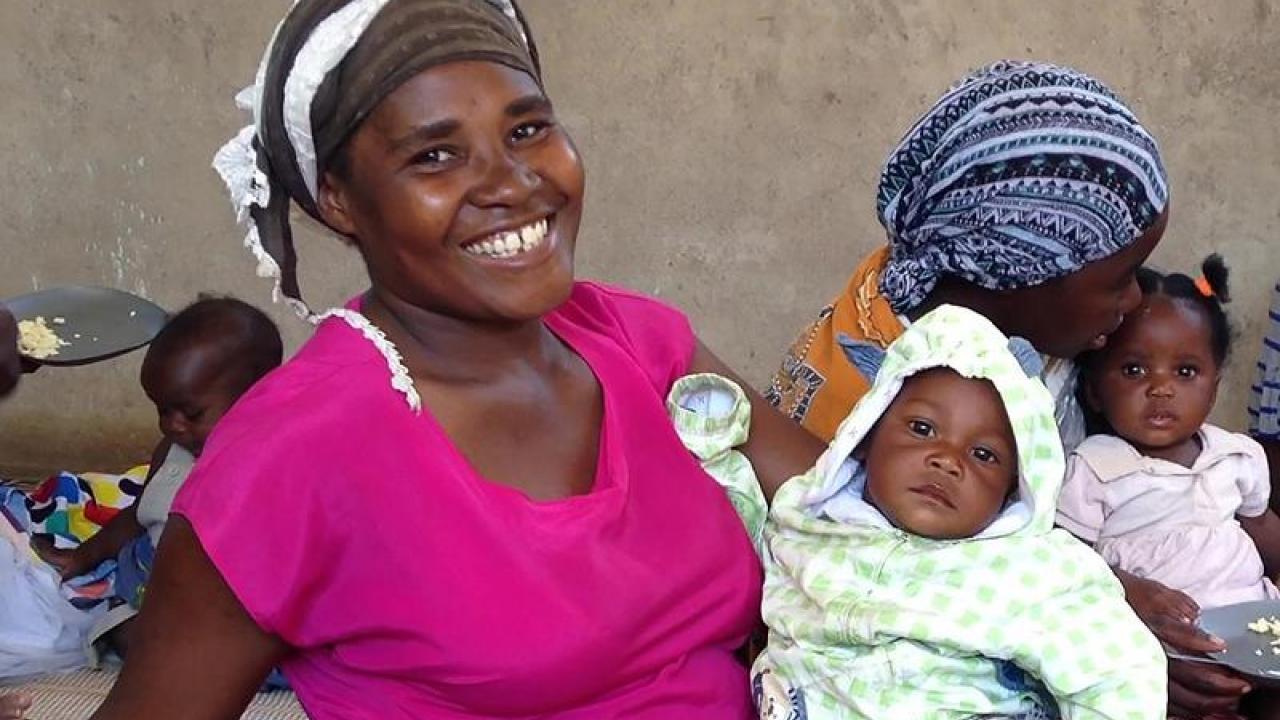 Study finds early interventions that promote caregiving and learning are more effective than nutrition in promoting brain development. (Elizabeth Prado/UC Davis) Woman and child in Malawi