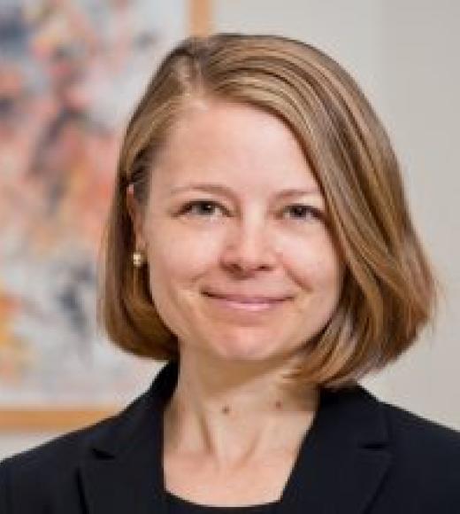 Kadee Russ, headshot, in black suit