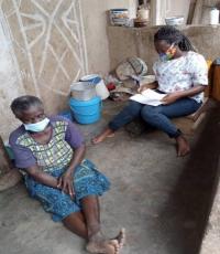 CoMIT interviewer and older woman, with masks