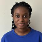 Christabel Domfe, headshot, in dark blue sweatshirt
