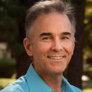 Paul Hastings face photo, in aqua blue shirt